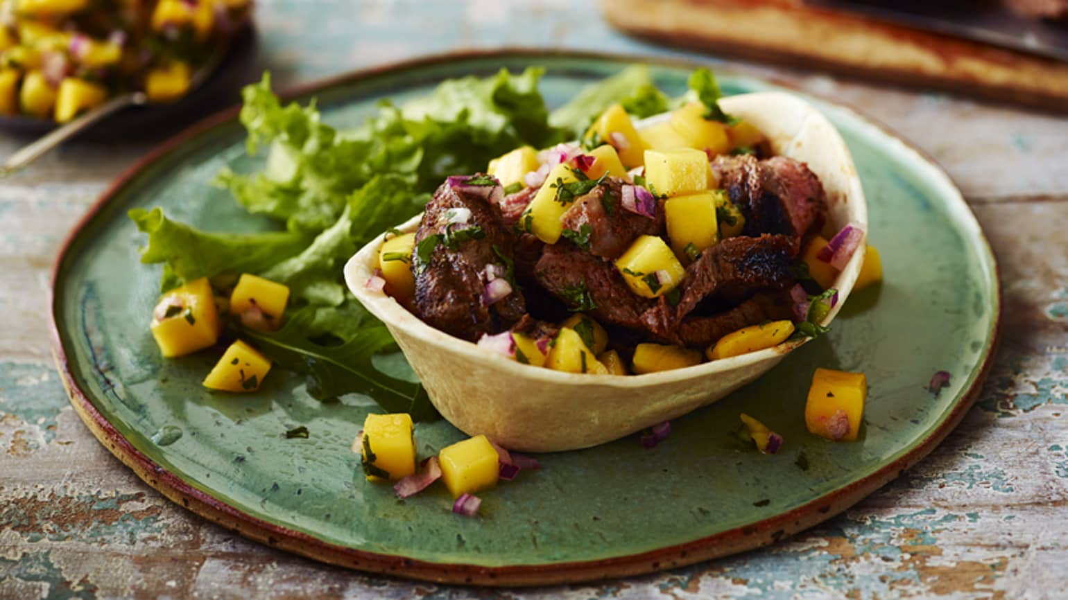 steak taco with mango salsa